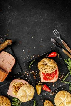 Flat lay composition of delicious hot dogs and sandwiches with different Stock Photos