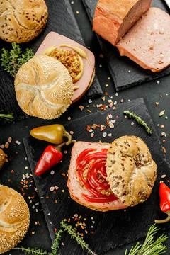 Flat lay composition of delicious hot dogs and sandwiches with different Stock Photos