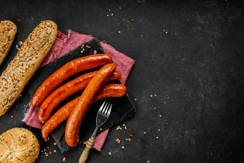 Flat lay composition of delicious hot dogs and sandwiches with different Stock Photos