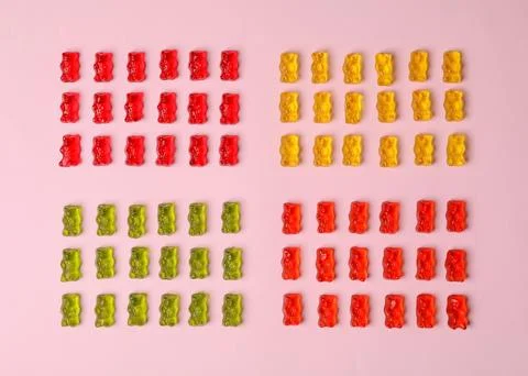 Flat lay composition with delicious jelly bears on color background Foto stock