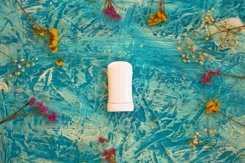 Flat lay composition with deodorant and herbs on color background 스톡 사진