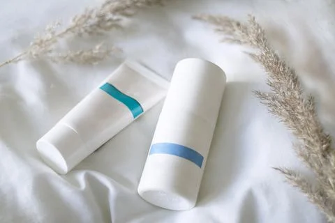 Flat lay composition with deodorant and hands cream Stock Photos