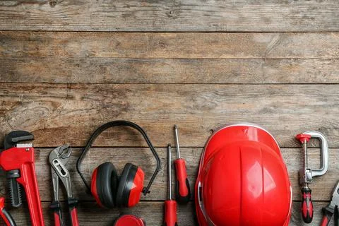 Flat lay composition with different construction tools and space for text on  Fotos de archivo