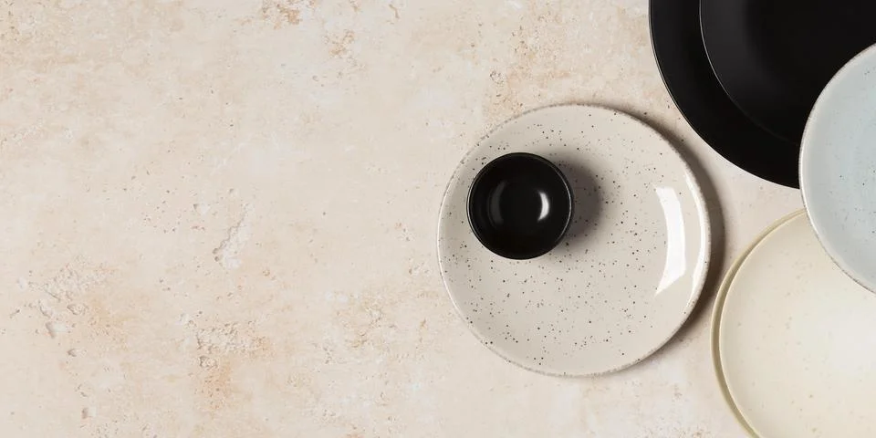 Flat lay composition of different sized plates Stock Photos