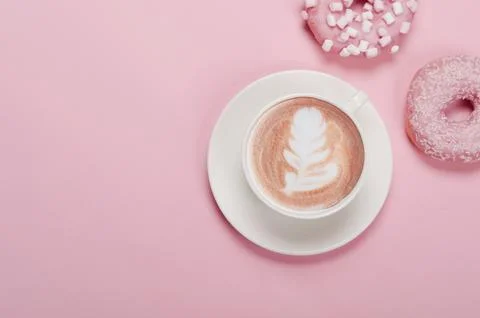 Flat lay composition with donuts and cup of coffee Stock Photos