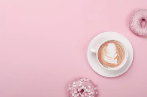 Flat lay composition with donuts and cup of coffee Stock Photos