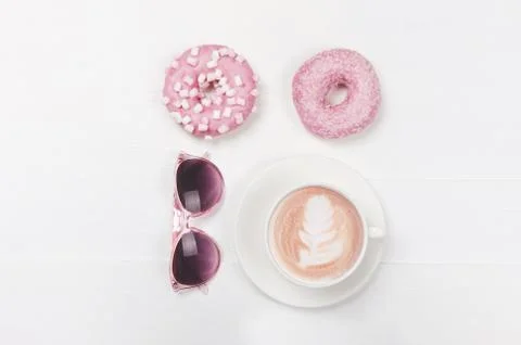Flat lay composition with donuts and cup of coffee Stock Photos