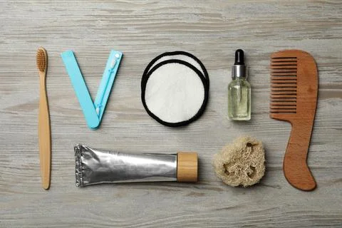 Flat lay composition with eco friendly products on wooden background. Conscio Stock Photos