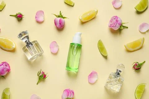 Flat lay composition with elegant perfumes on beige background Stock-Fotos