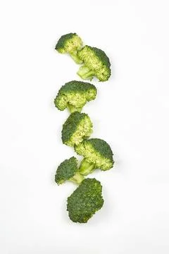 Flat lay composition with fresh green broccoli on white background Stock Photos