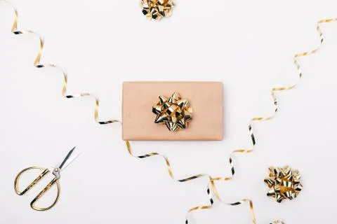 Flat lay composition gift box wrapped in brown paper Stock Photos