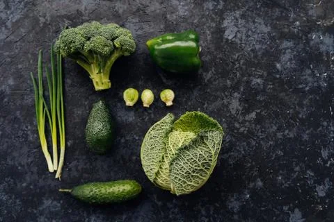 Flat lay composition of green vegetables. Raw fresh organic vegetables. Healthy Stock Photos