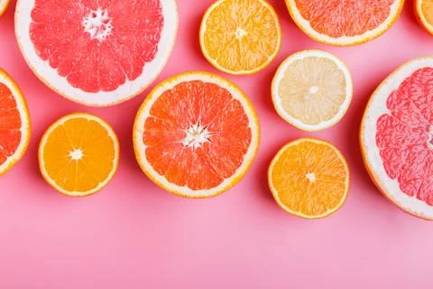Flat lay composition with halves of different citrus fruits Stock Photos