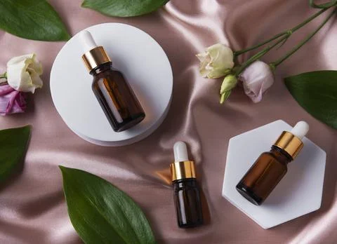 Flat lay composition with herbal essential oils Stock Photos