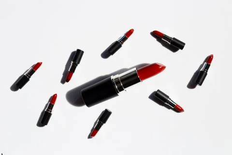 Flat lay composition, Lipsticks on white background with shadow. Beautiful Ma Stock Photos