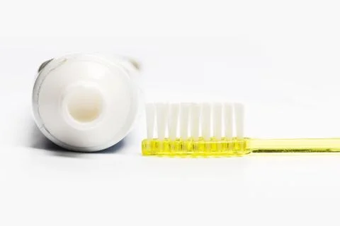 Flat lay composition with manual toothbrushes on white background. Stock Photos
