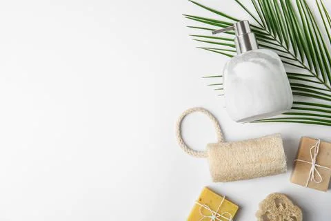 Flat lay composition with marble soap dispenser on white background. Space fo Foto stock