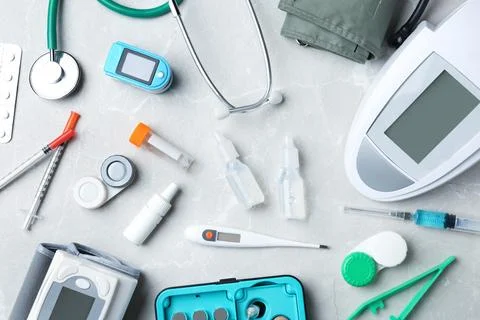Flat lay composition with medical objects on grey background Stock Photos