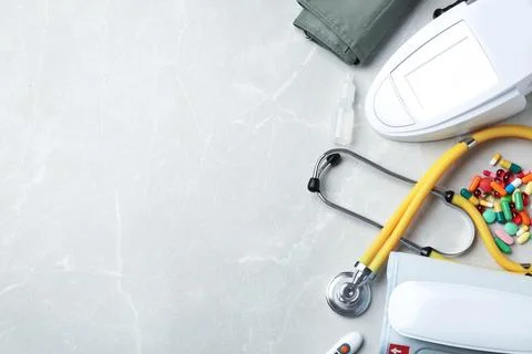 Flat lay composition with medical objects and space for text on grey backgrou Stock Photos