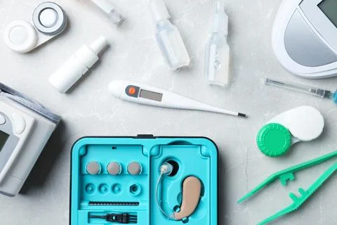 Flat lay composition with medical objects on grey background 스톡 사진