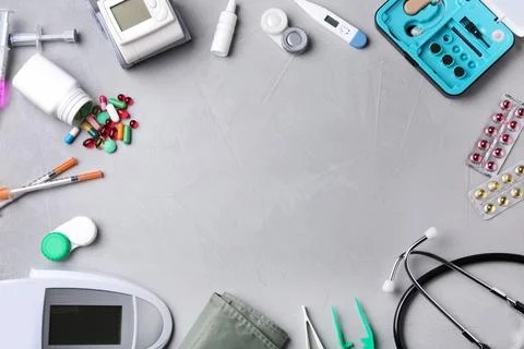Flat lay composition with medical objects and space for text on grey backgrou Stock Photos