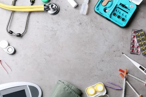Flat lay composition with medical objects and space for text on grey backgrou Stock Photos