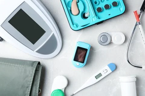 Flat lay composition with medical objects on grey background Stock Photos