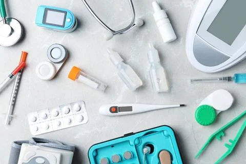 Flat lay composition with medical objects on grey background Stock Photos