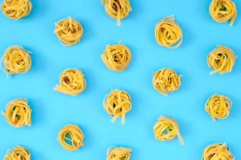 Flat lay composition with noodles raw on color background blue Stock Photos