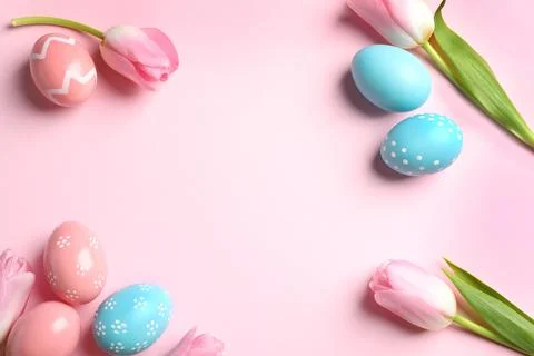 Flat lay composition with painted Easter eggs on color background, space for  Stock Photos