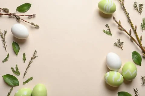 Flat lay composition with painted Easter eggs on color background, space for  Stock Photos