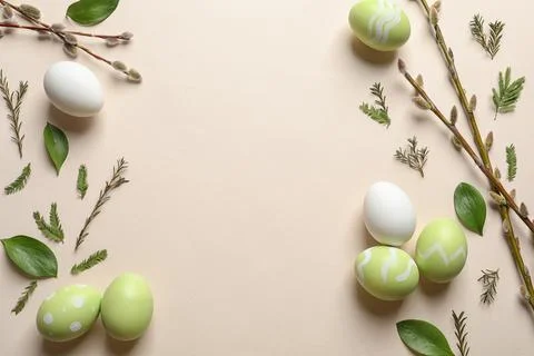 Flat lay composition with painted Easter eggs on color background, space for  Stock Photos
