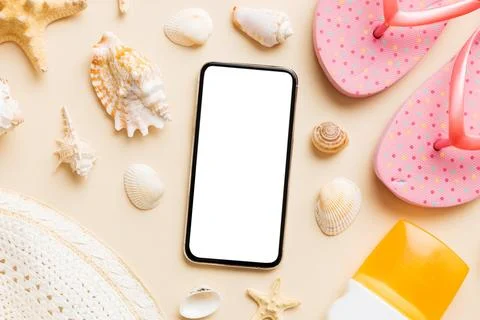 Flat lay composition with Phone and beach accessories on colored background.. Stock Photos