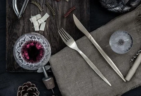 Flat lay composition with pitcher and glasses of red wine and corkscrew. Stock Photos