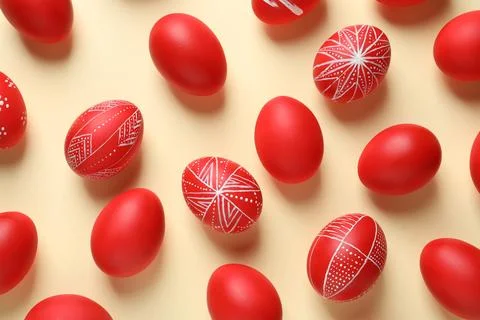 Flat lay composition of red painted Easter eggs on color background 스톡 사진