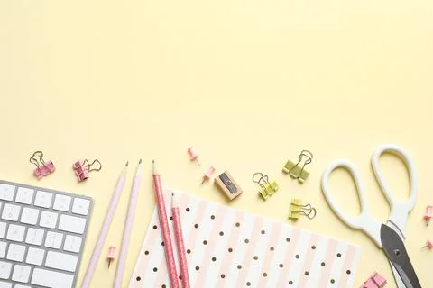 Flat lay composition with scissors and office supplies on color background. S Stock Photos