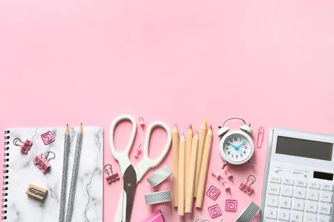 Flat lay composition with scissors and office supplies on color background. S Stock Photos