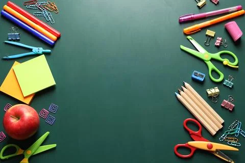 Flat lay composition with scissors and school supplies on chalkboard. Space f 스톡 사진