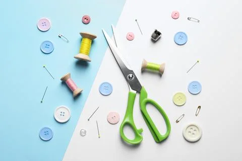 Flat lay composition with scissors on color background Stock Photos