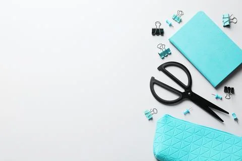 Flat lay composition with scissors on grey background. Space for text Stock Photos