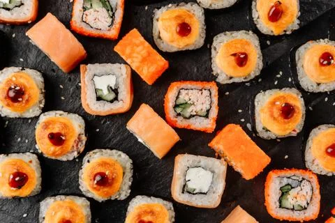 Flat lay composition with a set of rolls on a stone dish. Foto stock