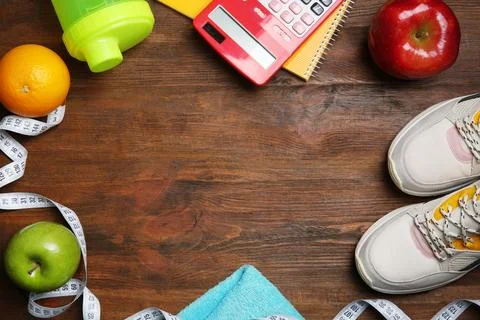 Flat lay composition with sneakers, healthy food, calculator and space for te 스톡 사진