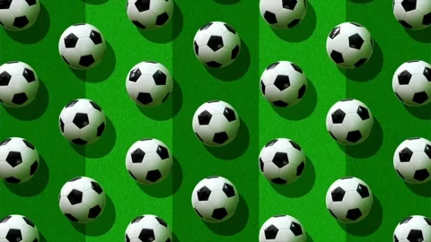 Flat lay composition of soccer balls on grassy texture with top view camera angl Stock Footage 313560641