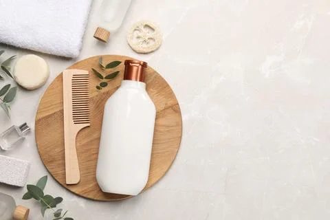 Flat lay composition with solid shampoo bar and bottle of cosmetic product .. 스톡 사진