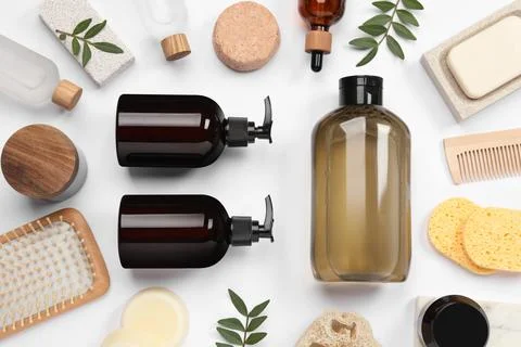 Flat lay composition with solid shampoo bar and bottles of cosmetic product.. Stock Photos
