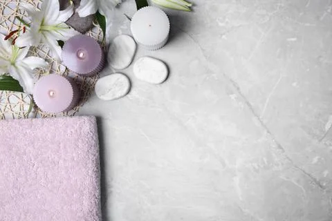 Flat lay composition with spa accessories and space for text on grey marble b Stock-Fotos