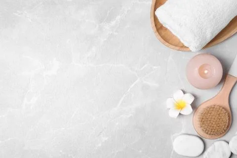 Flat lay composition with spa accessories and space for text on light backgro Stock-Fotos