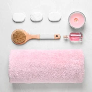 Flat lay composition with spa accessories on light background Stock Photos