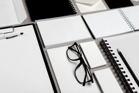Flat lay composition with stationery on grey background. Mock up for design Foto stock