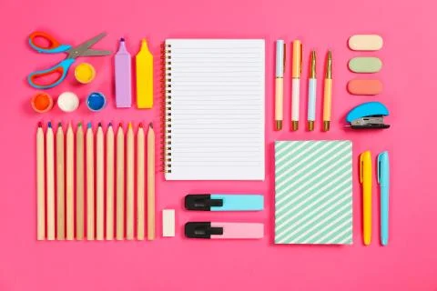 Flat lay composition with stationery on pink background, space for text Stock Photos